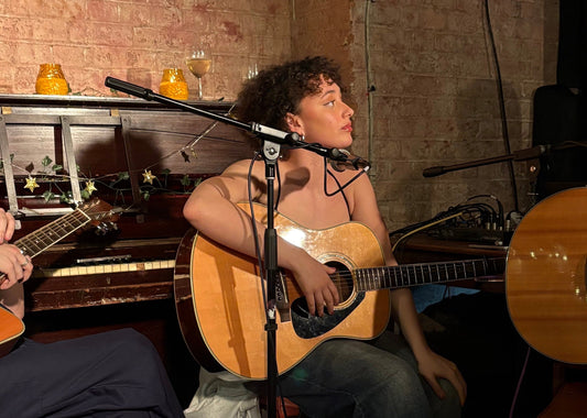 Musician Ashlie Skye wearing Tracey Neuls Julip on stage