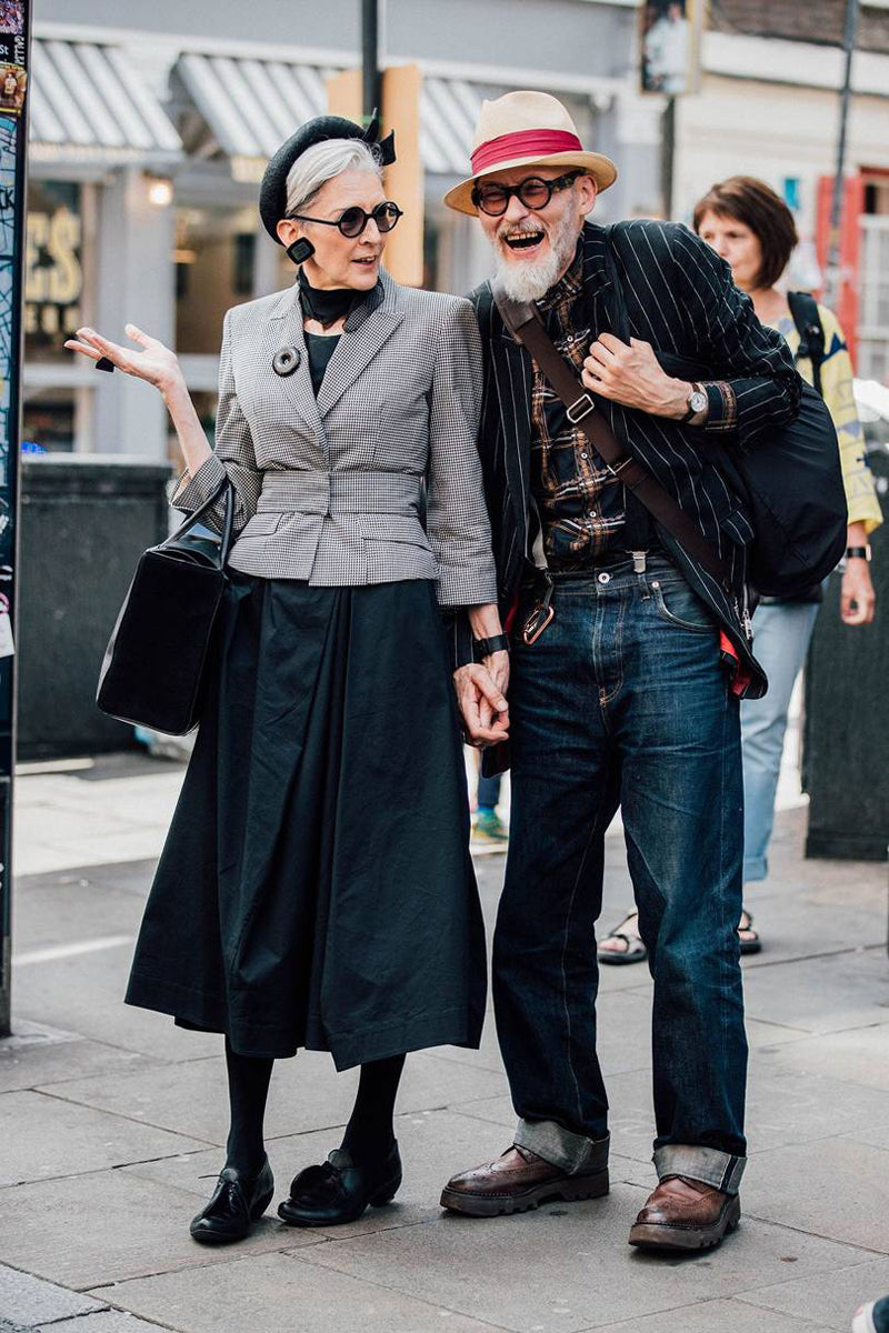 Cool. older couple photographed for Vogue Street style, the woman wears black heels by Tracey Neuls