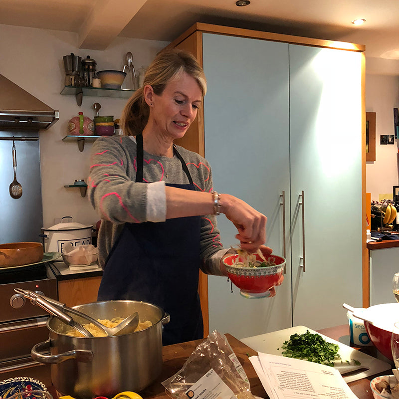 Tracey Neuls enjoying a cooking class by Alli Godbold 