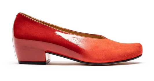 Red shoes in patent and suede leather by footwear and accessories designer Tracey Neuls