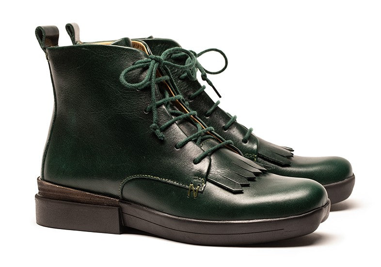 Pair of alpine green lace up roper boots for women