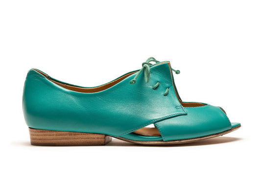 Turquoise blue green flat leather peep toe sandal shoes with sculpted detail by designer Tracey Neuls