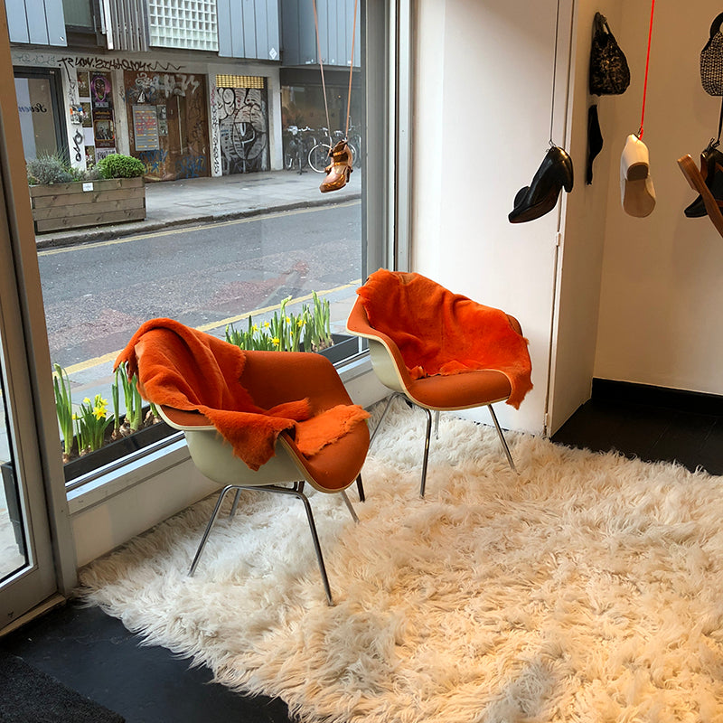 Vintage orange Ray Eames Chairs at Tracey Neuls Redchurch Street