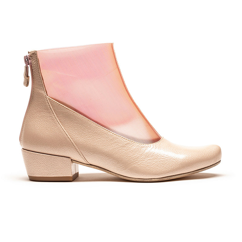 Pink patent leather and PVC mid heel ankle boot by Tracey Neuls