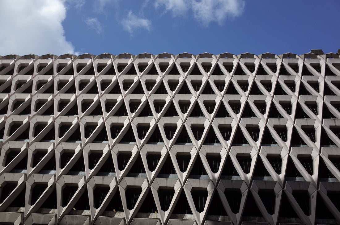 large concrete building with facade of geometric diamond shapes, Welbeck Street car park.
