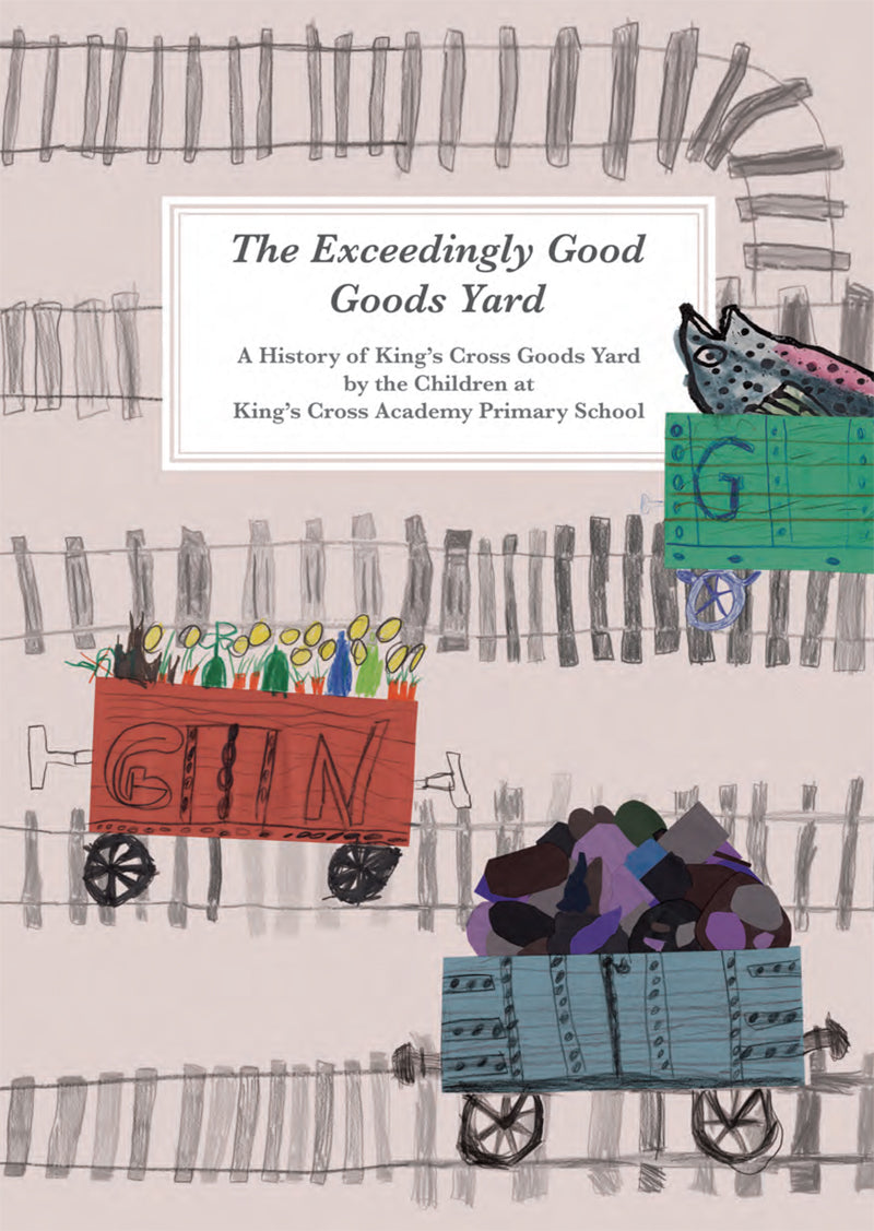 Book titled 'The Exceedingly Good Goods Yard' with cover featuring children's drawings of coal carts on a railway track. 