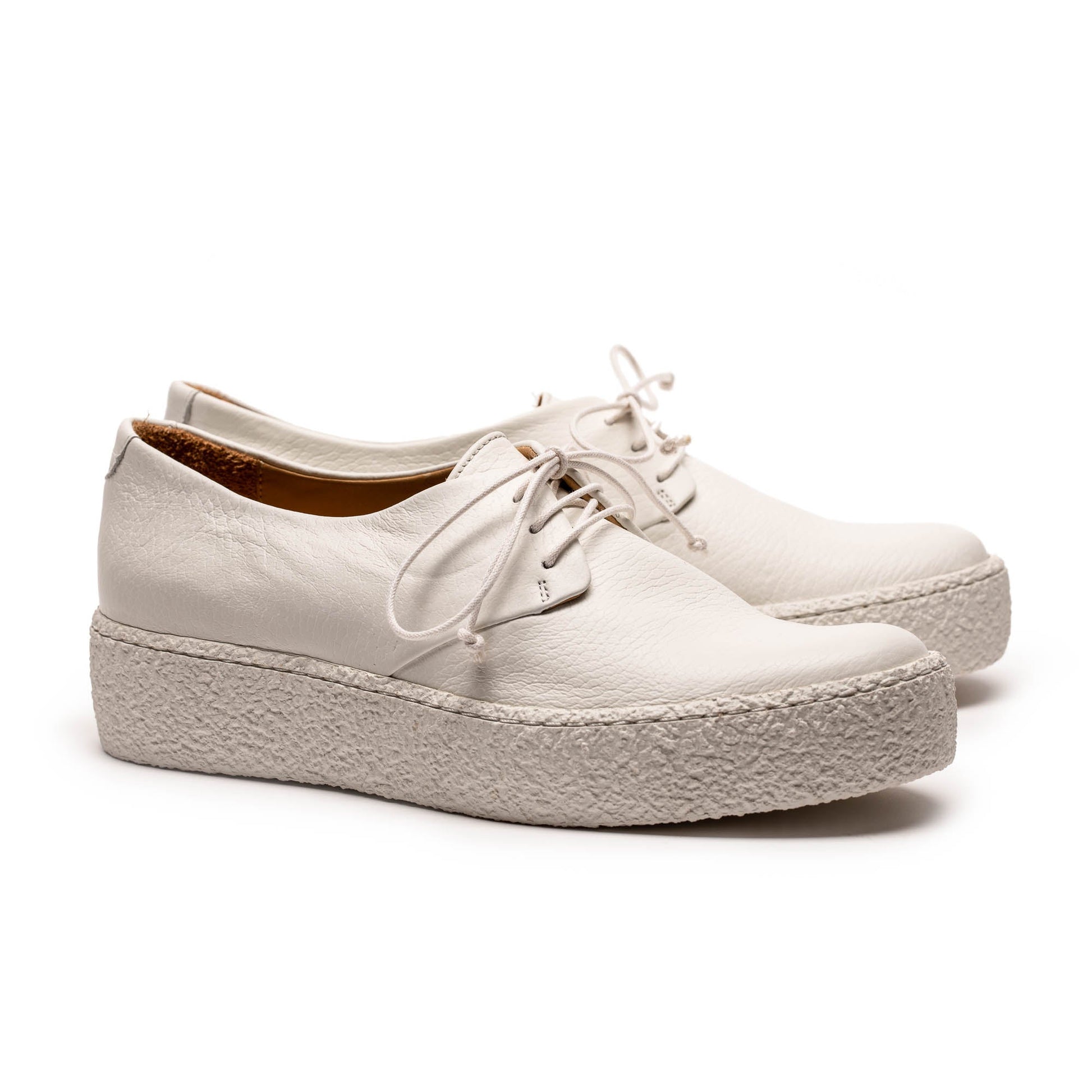 white leather platform sneaker designed by tracey neuls