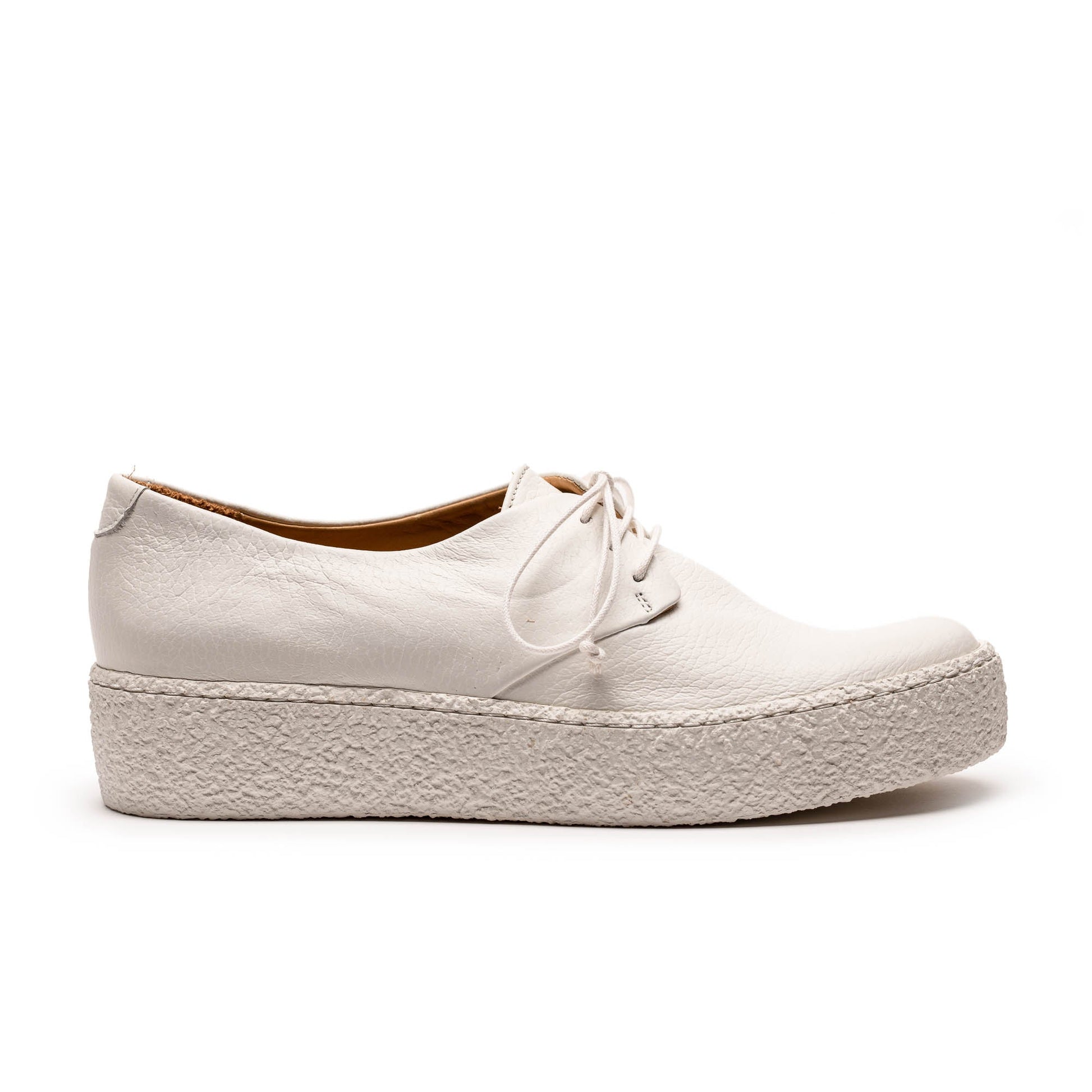 white leather platform sneaker designed by tracey neuls